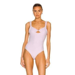 Jonathan Simkhai Lavender One-Piece Swimsuit

SIMKHAI
Holly Swimsuit In Lupine